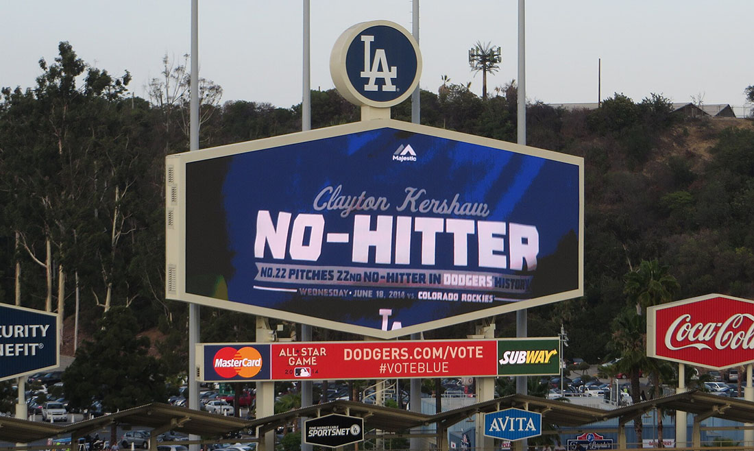 Los Ángeles Dodgers no hitter Clayton Kershaw | Santa Monica Sun Large scoreboard at a Dodgers stadium displaying the word 'NO-HITTER' in bold letters, with 'Clayton Kershaw' above and Dodgers branding nearby.