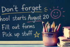 Back-to-school reminder on a chalkboard: 'School starts August 20'; list: 1) Fill out forms 2) Pick up stuff, with a pencil cup and stacked books nearby.