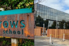 Rust-colored Seven Arrows Elementary School sign with greenery, and a modern glass-front building with a wooden fence nearby on campus.